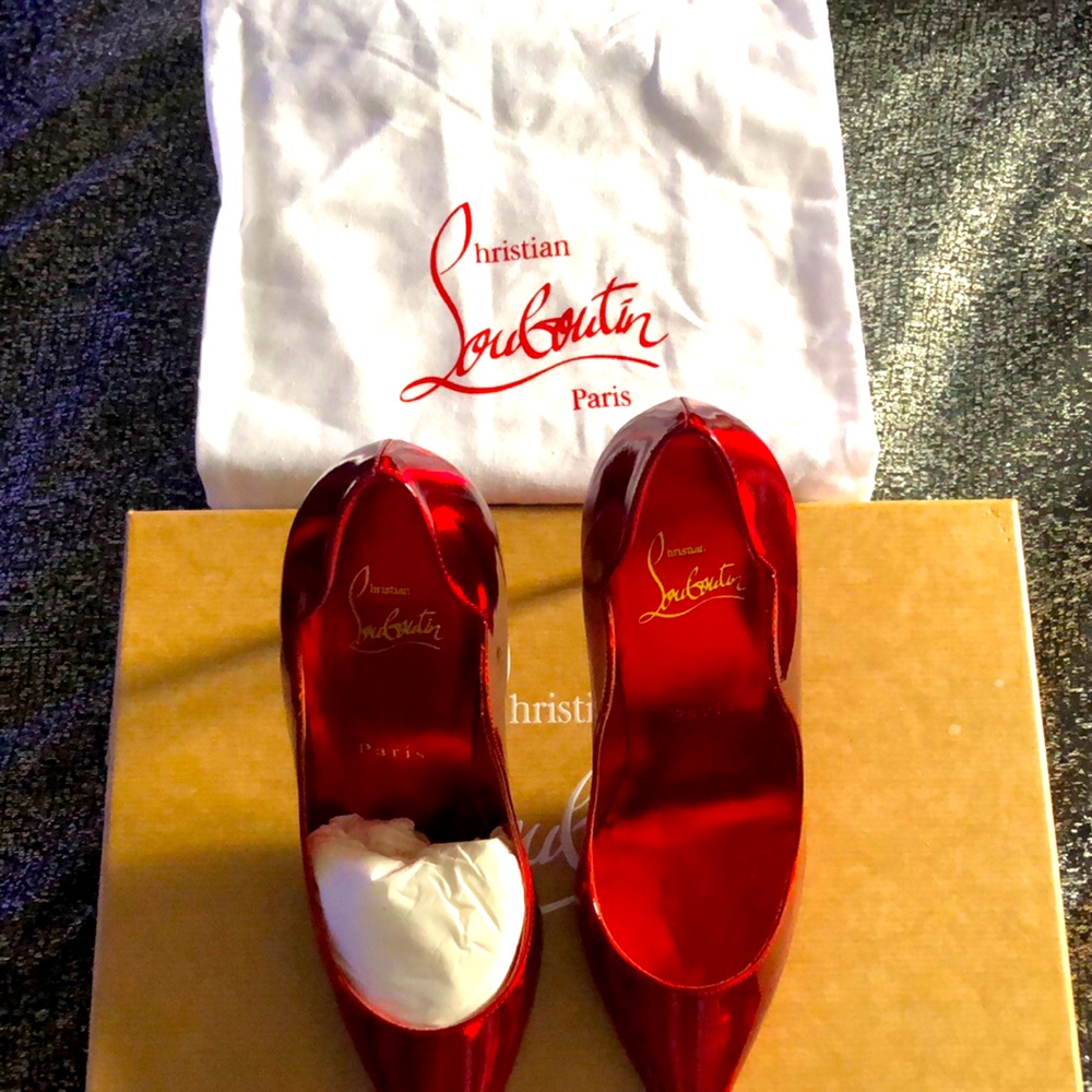 Christian Louboutin heels. Red